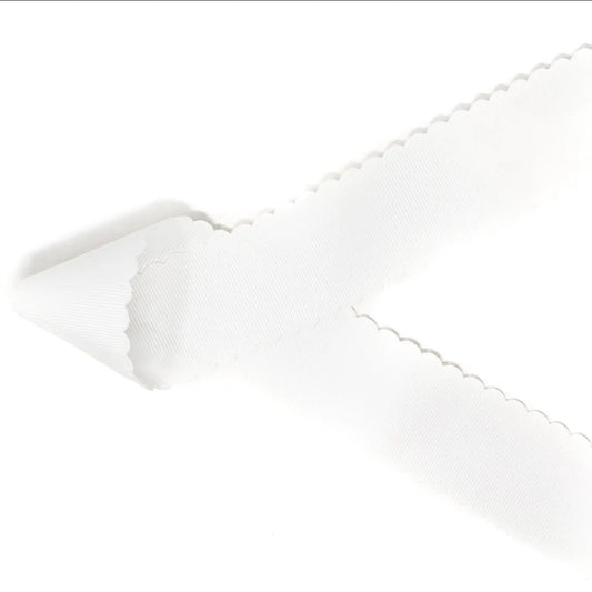 white scalloped bow