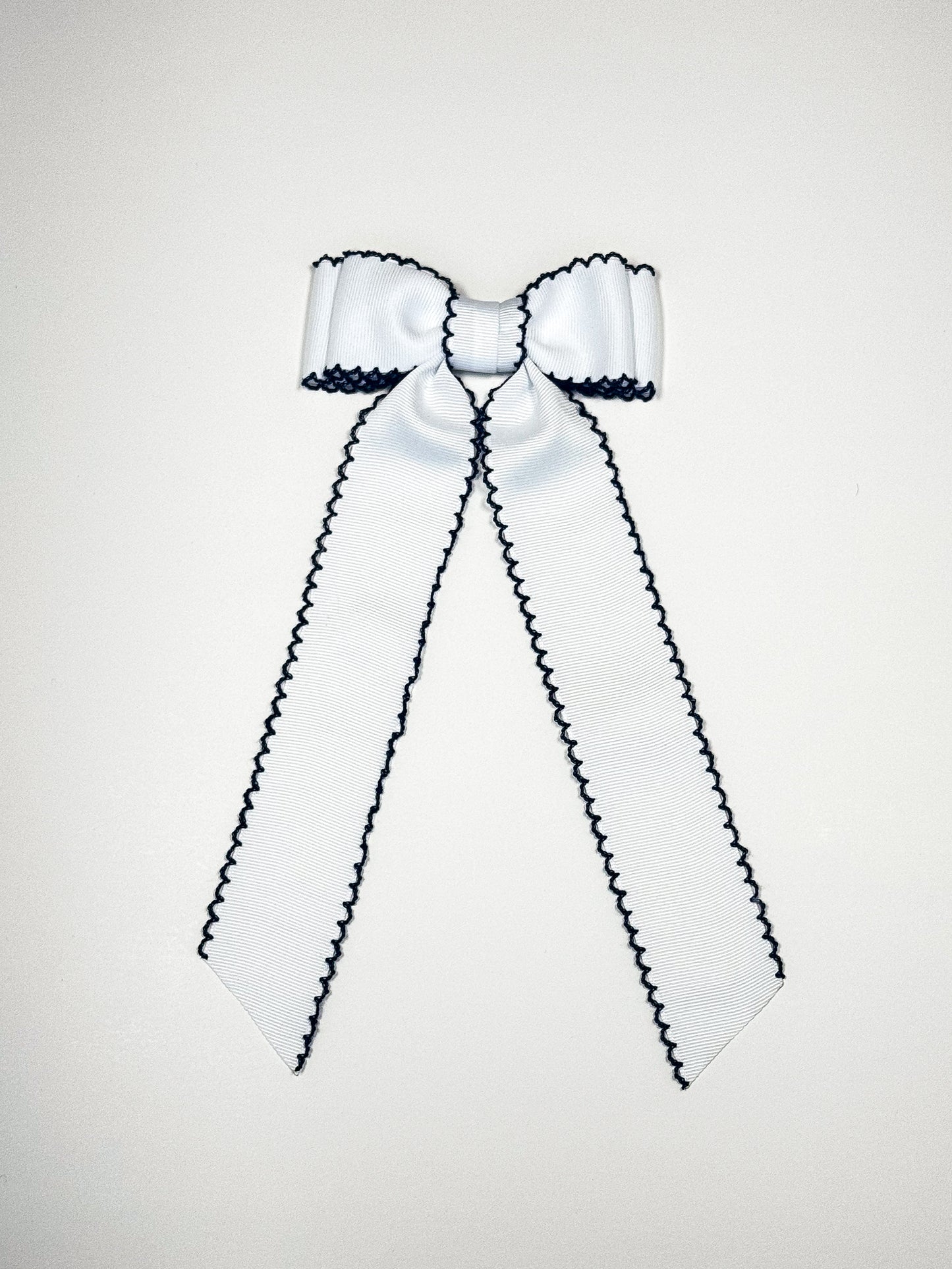 white navy moonstitch