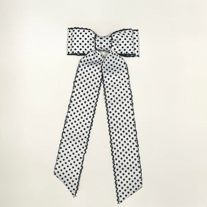 white and black swiss dot