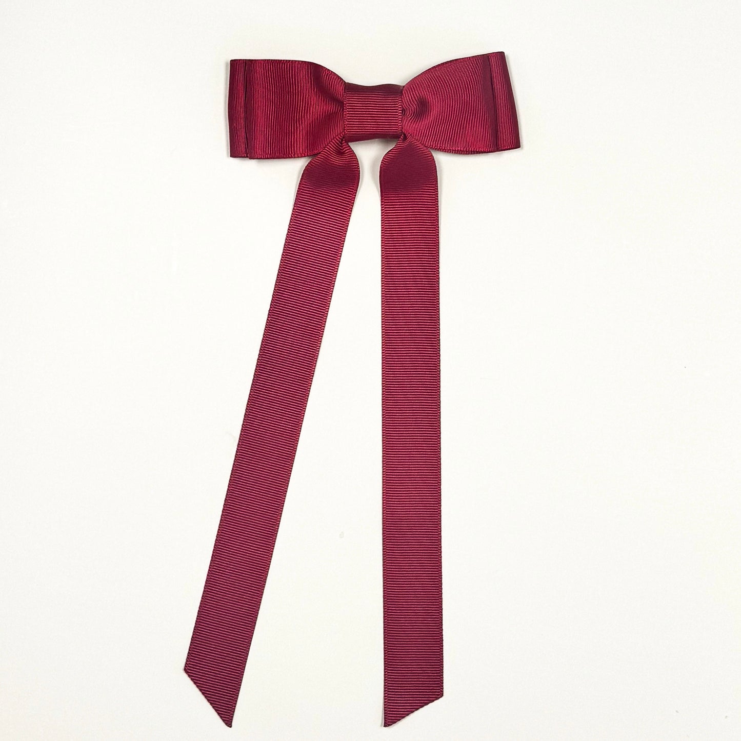 maroon bow