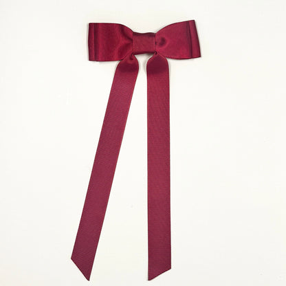 maroon bow