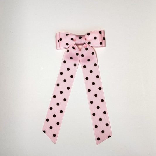 pink and brown polka dot bow