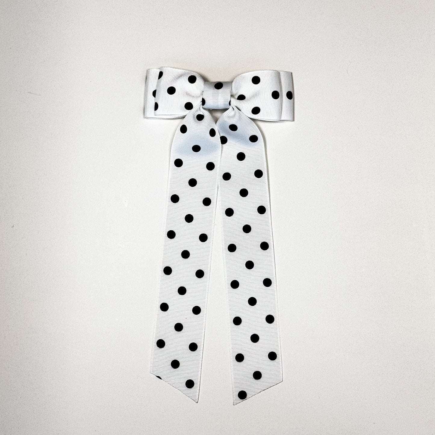 white and black polka dot