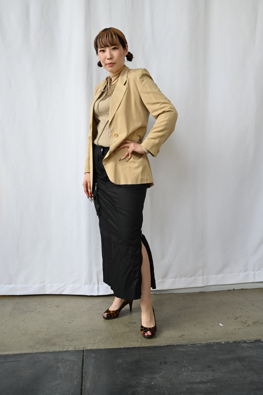 The beige designer blazer