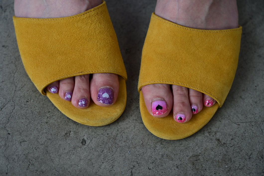 The yellow suede sandals