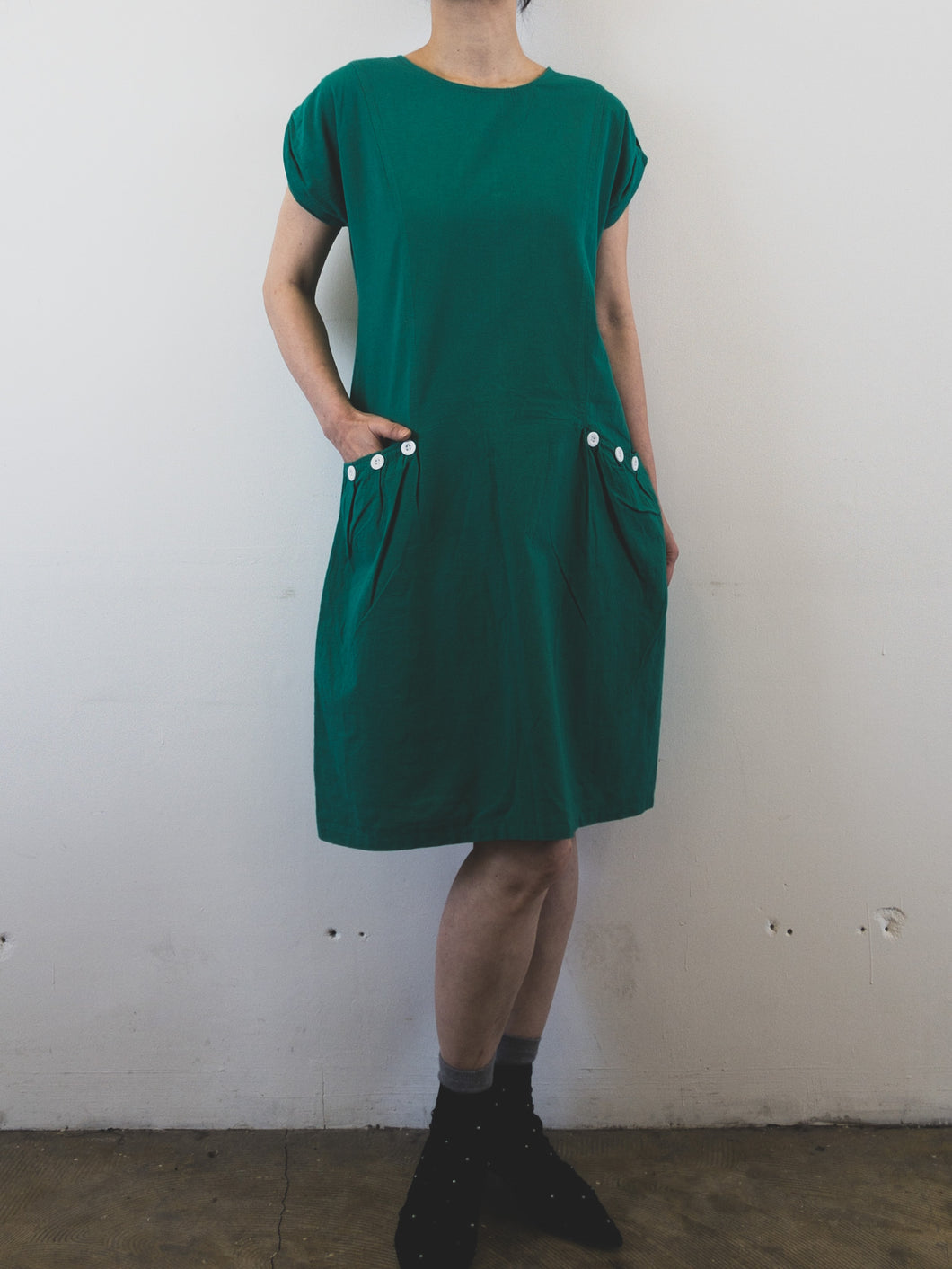 The emerald green 80s/90s one-piece