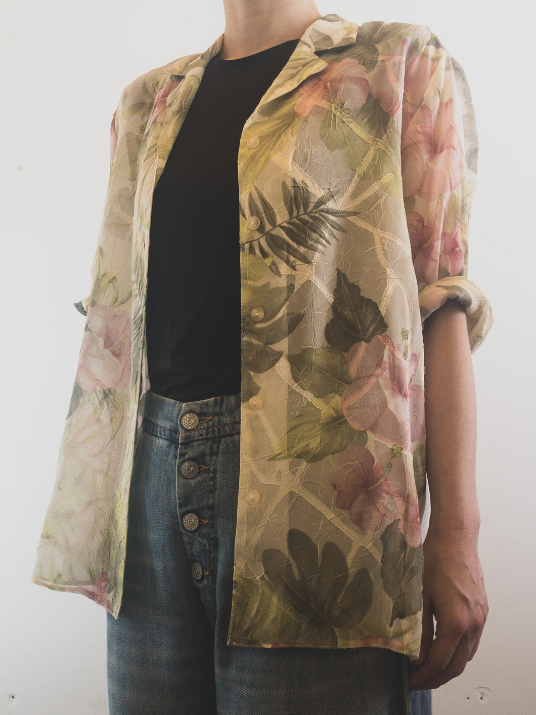 The transparent floral blouse