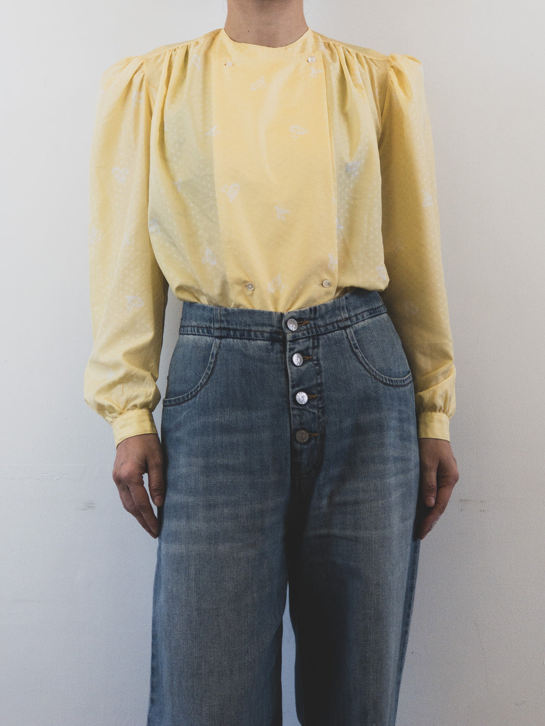 The pastel yellow vintage blouse