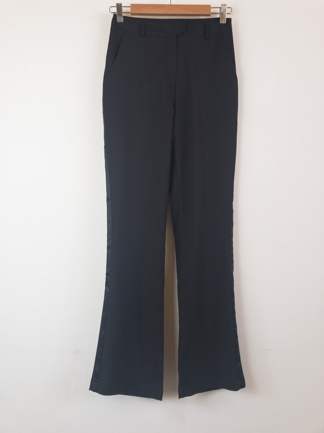 The black slacks with shiny side stripe