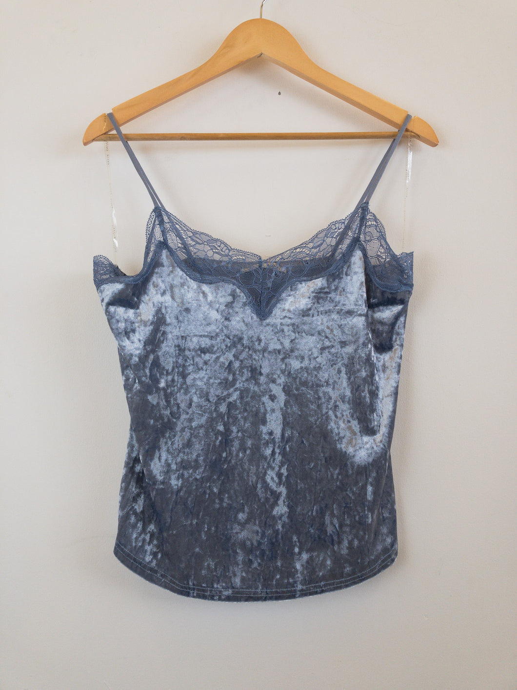 The faux velvet blue top with lace