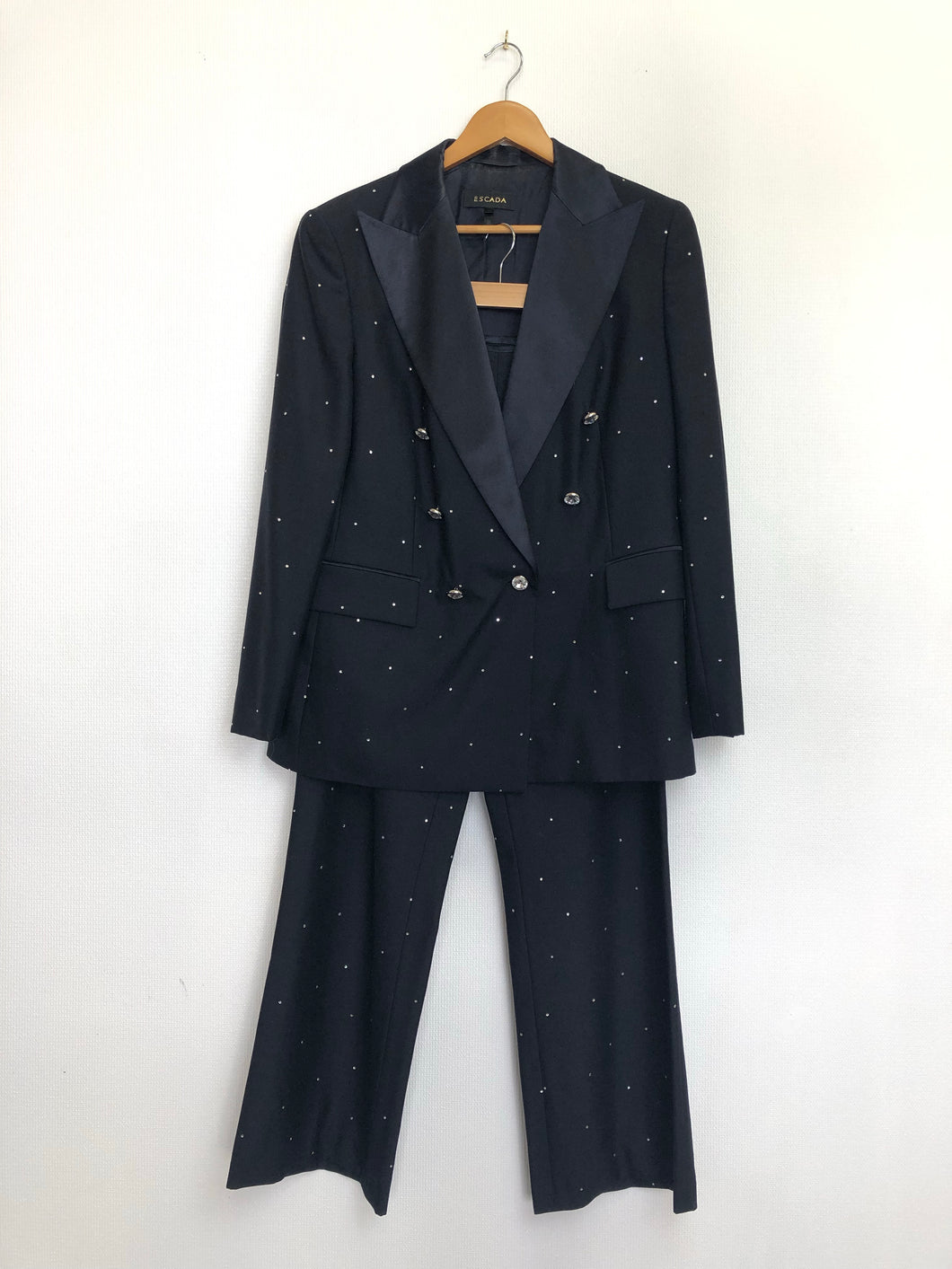 The designer pants suit with shiny stones