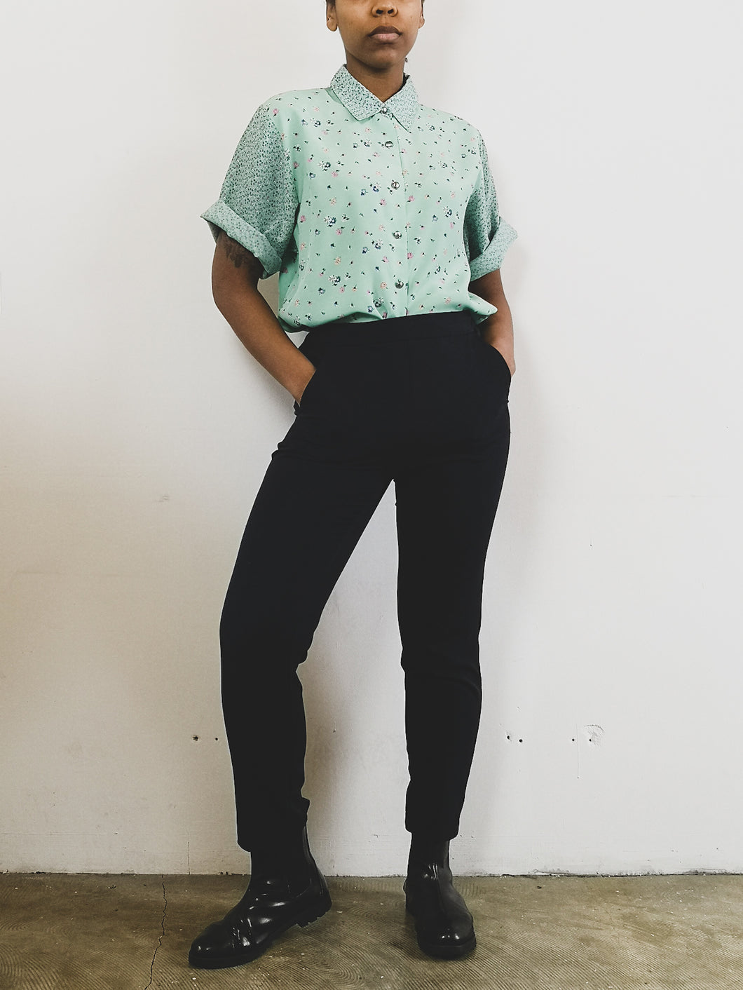 The mint blouse with floral pattern