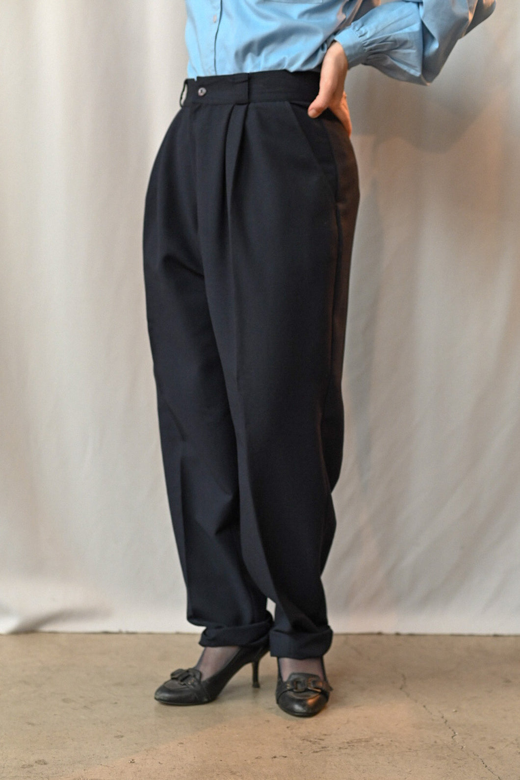 The pleated high waist navy pants